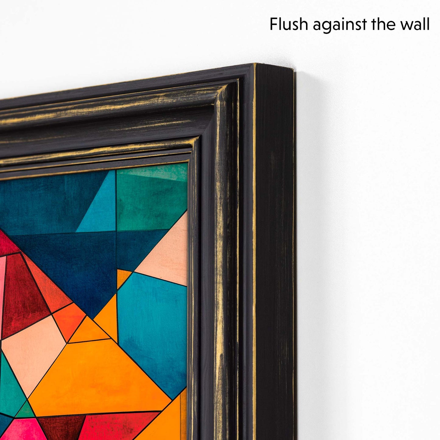 Black distressed Tv frame flushes against the wall