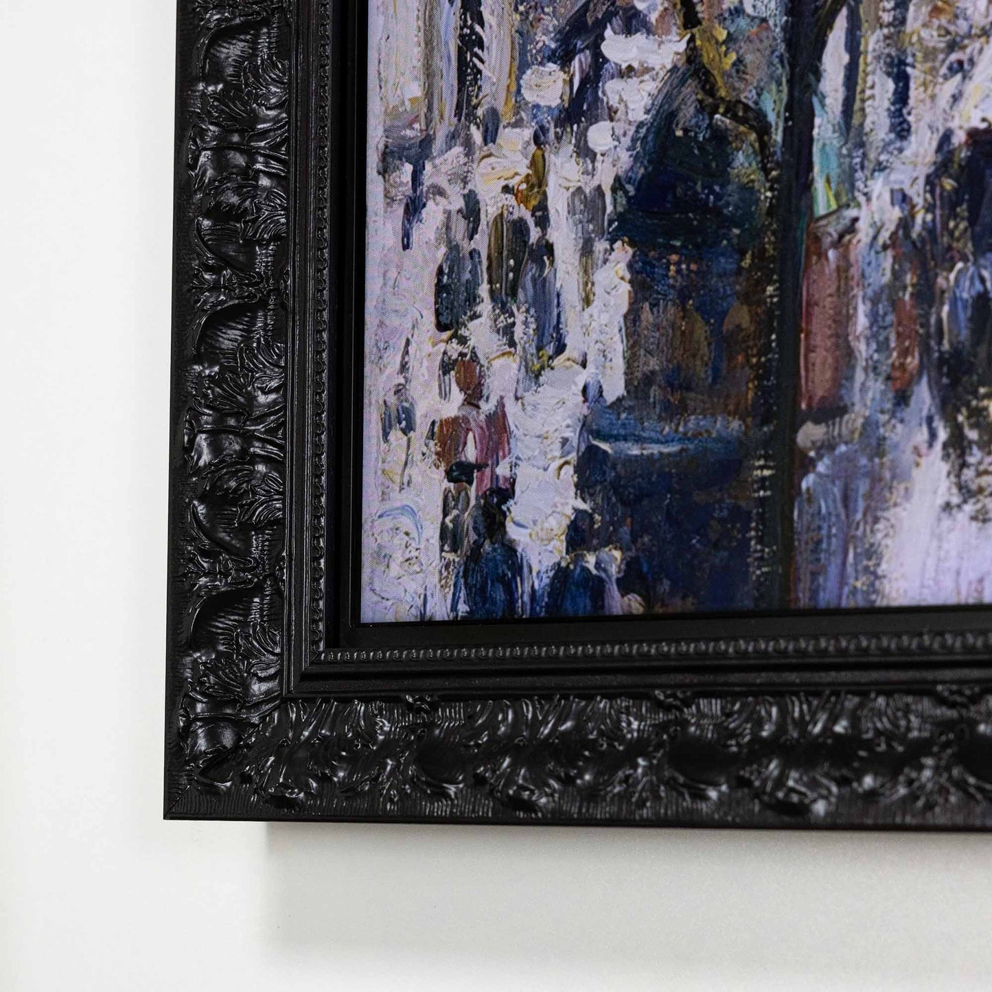 Close up to ornate Black TV Frame corner