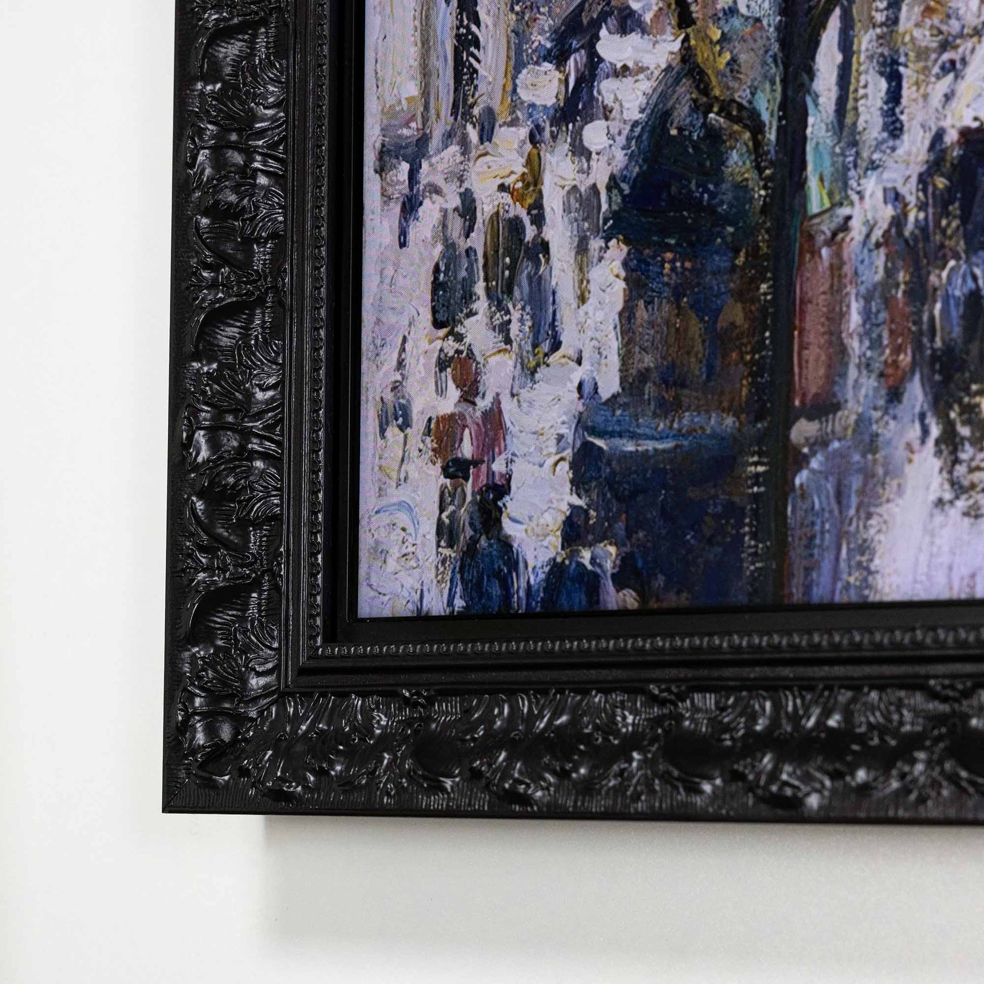 Close up to ornate Black TV Frame corner