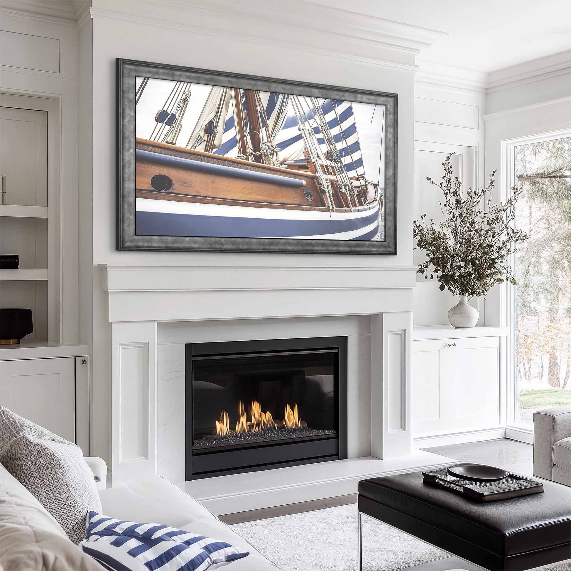 Gray TV frame above the fireplace in traditional living room design