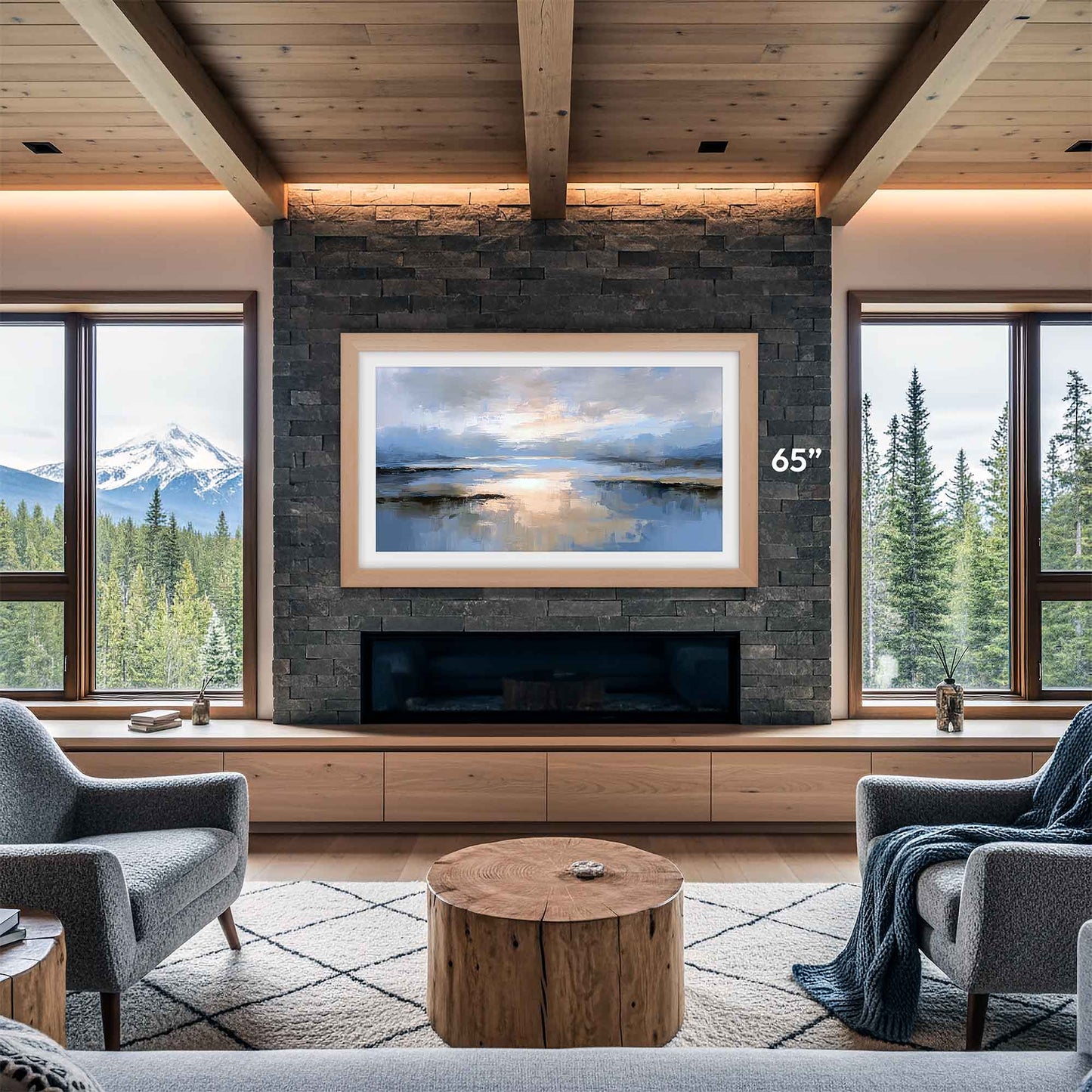 Modern living room with a large TV mounted on a stone wall, surrounded by windows with scenic views.