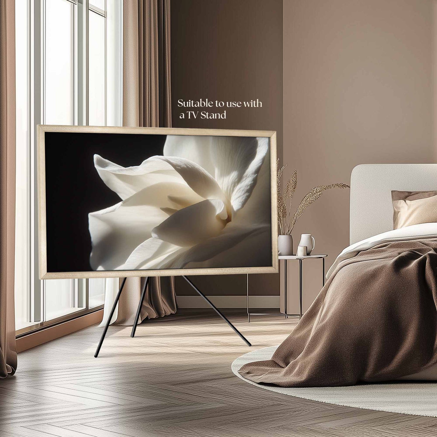 Silver TV frame for The Frame 55 inch TV on studio Stand in modern bedroom