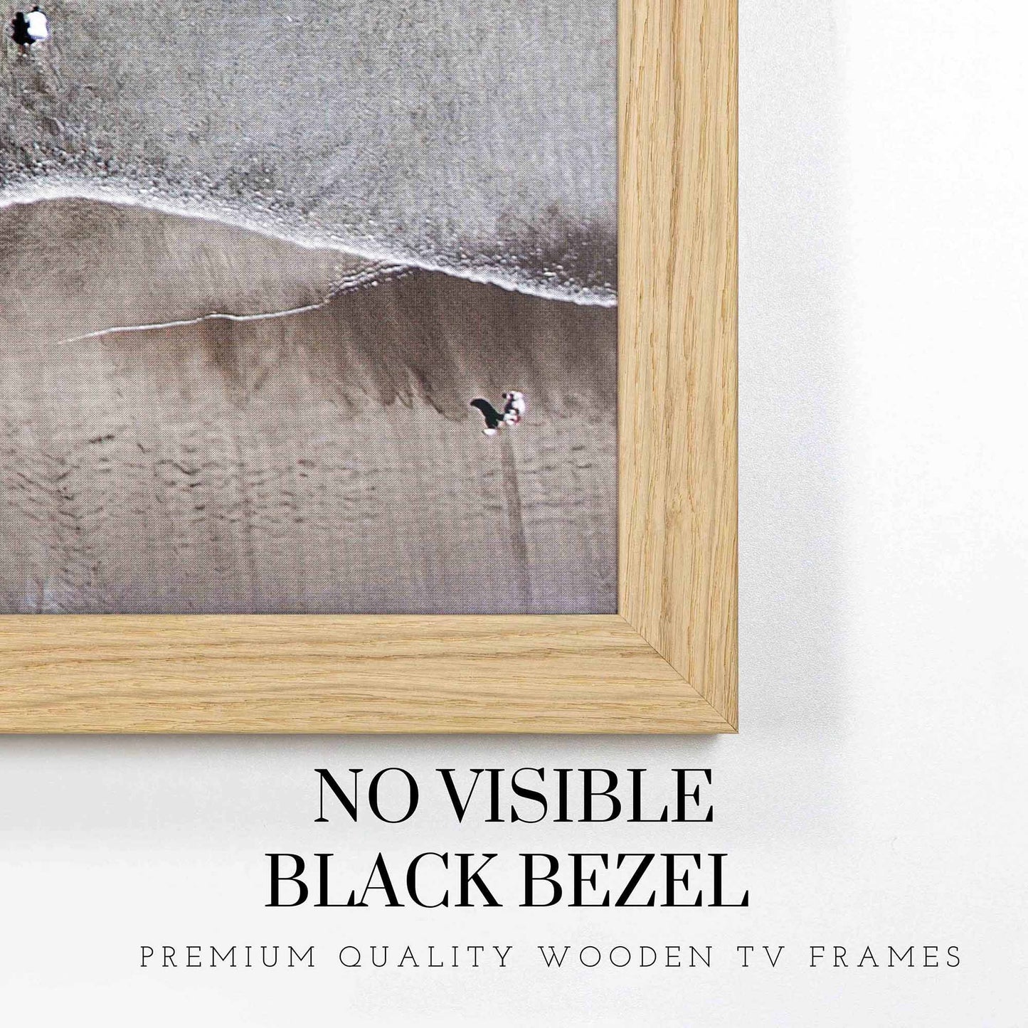 Thin oak TV frame fully covers tv's black bezel