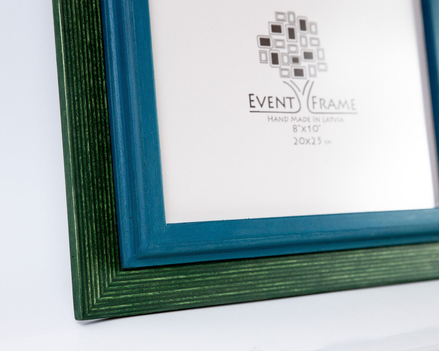 Green picture frame with 'Event Frame' label on a white background. blue and green double color picture frame from solid durable long lasting materials birch hardwood in stripy texture design