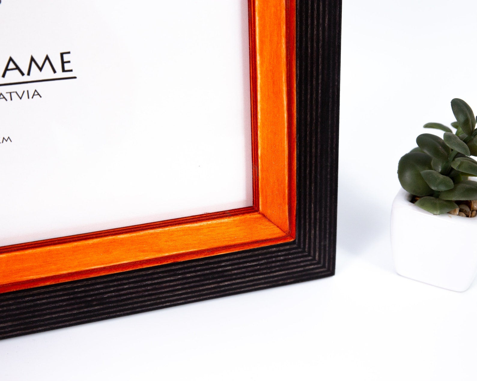 Close-up of a black and orange picture frame with a blurred background. Custom Wood Picture Frame, Black + Orange Colors, Rustic Photo Frame, SIZES 5x7, 8x10, A4, 9x11, A5, A3, 4x6, 20x30, 7x9, 16x20, 18x24, 8x12