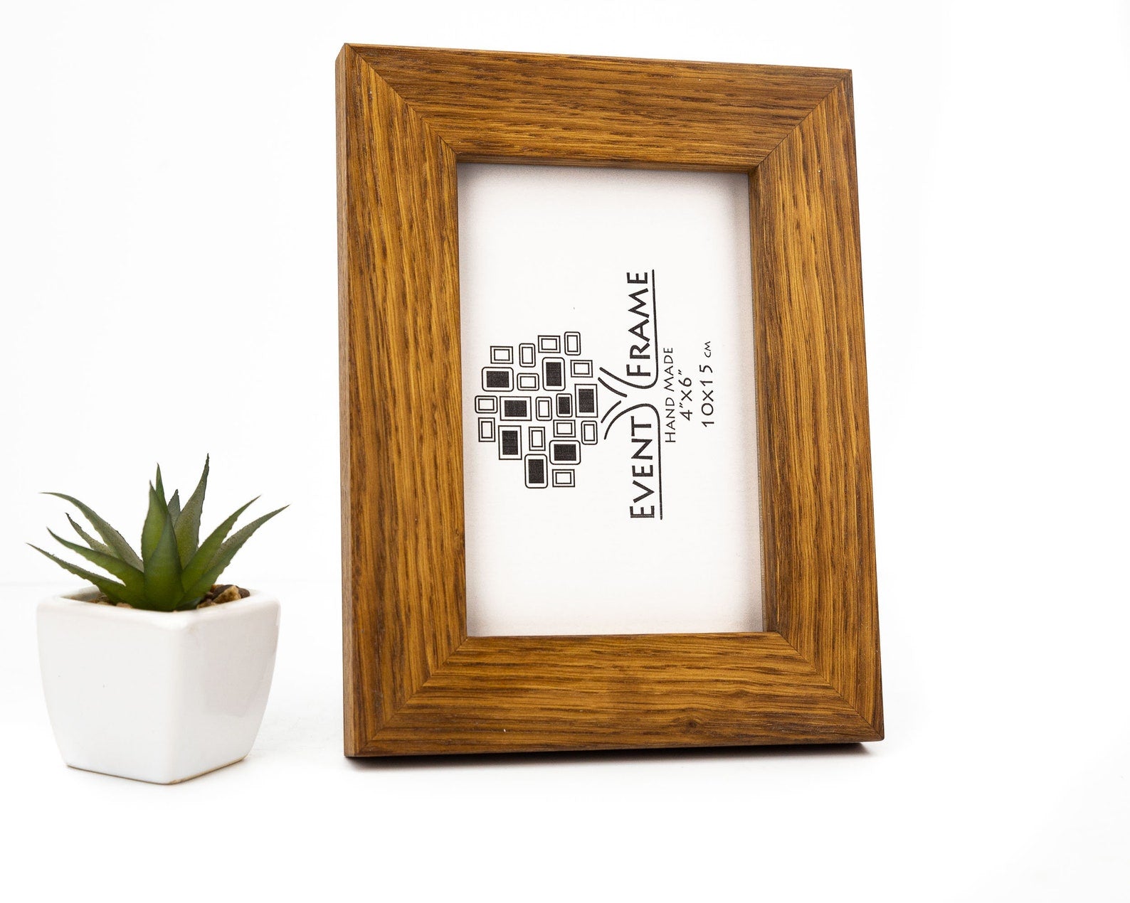 Wooden picture frame with a plant on a white background. Oak Wood Photo Frame, Brown Rustic Picture Frame, Any Custom Size Gallery Frame A4, A3, A2, A1, 4x6, 5x7, 8x10, 9x12, 10x14, 16x20, 18x24