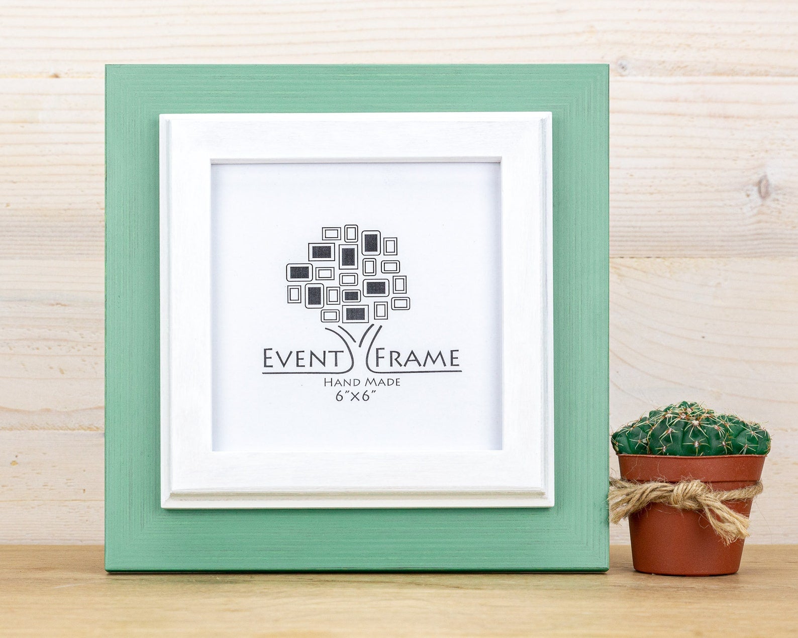 Green picture frame with white mat on a wooden surface, featuring 'Event Frame' branding. Grey and white rustic birch frame with handmade charm and clean contrast. Eco-finished and perfect for art, photos, or calm modern wall décor.