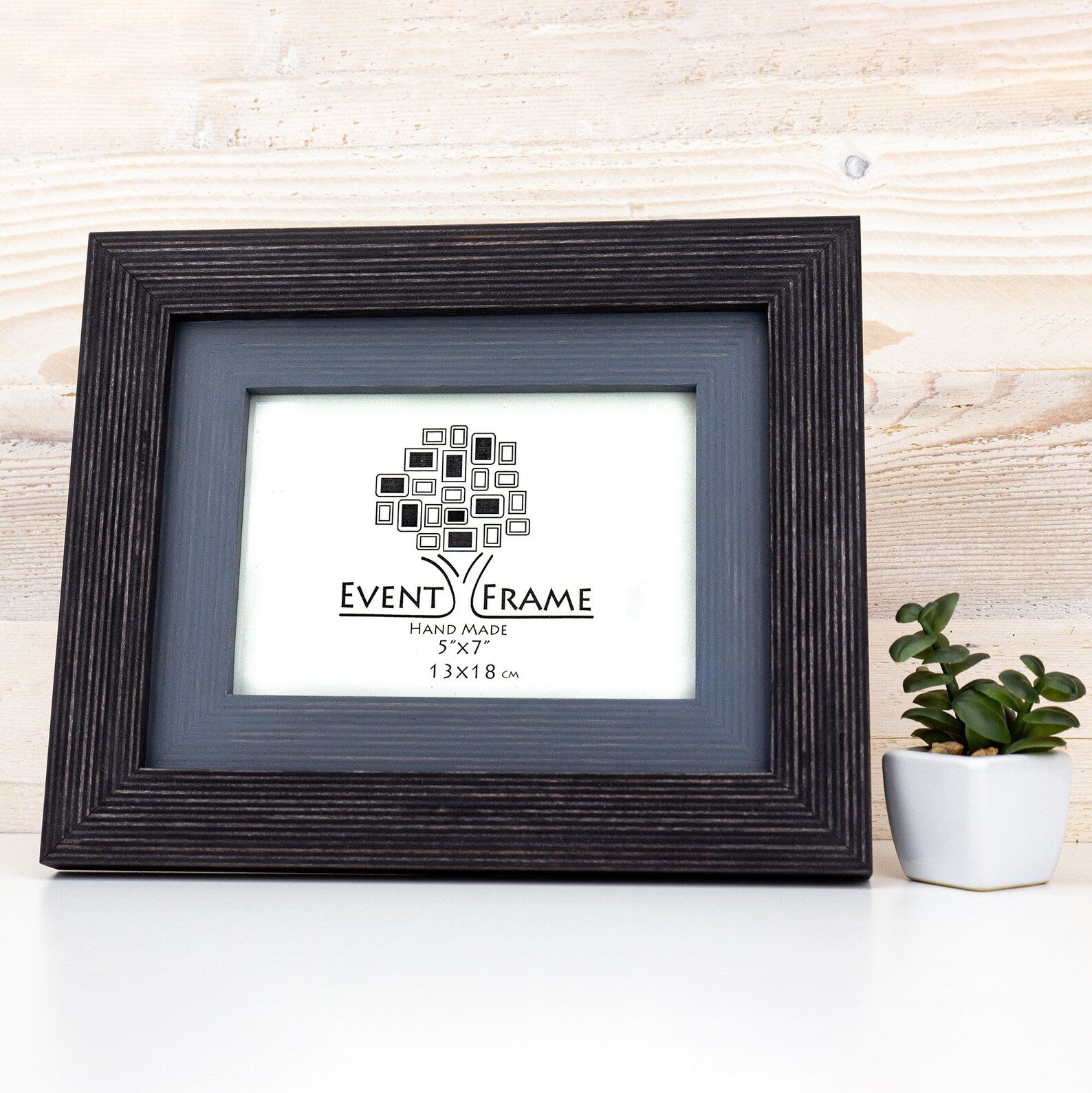 Black picture frame with 'Event Frame' label on a white surface with a wooden background. Black + Grey Handmade Picture Frame, Photo Frame with Wooden Mat, Two Tone Poster Wall Frame, Custom Sizes A1 A2 5x7 8x10 18x24 24x36 20x30