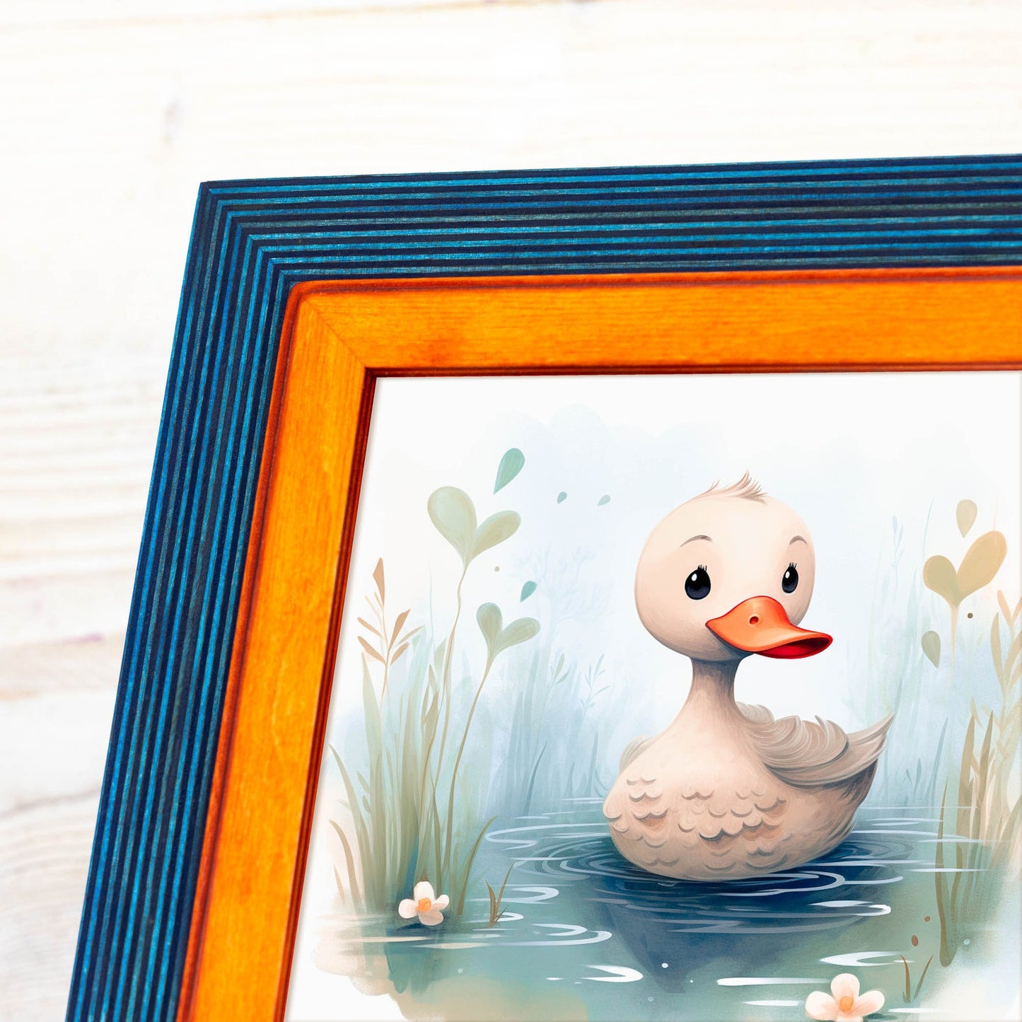 Framed illustration of a duck in water with a colorful frame. Add rustic elegance with this grey + white birch frame. Handmade and built to last, ideal for artwork, photo décor, or Scandi-inspired homes.