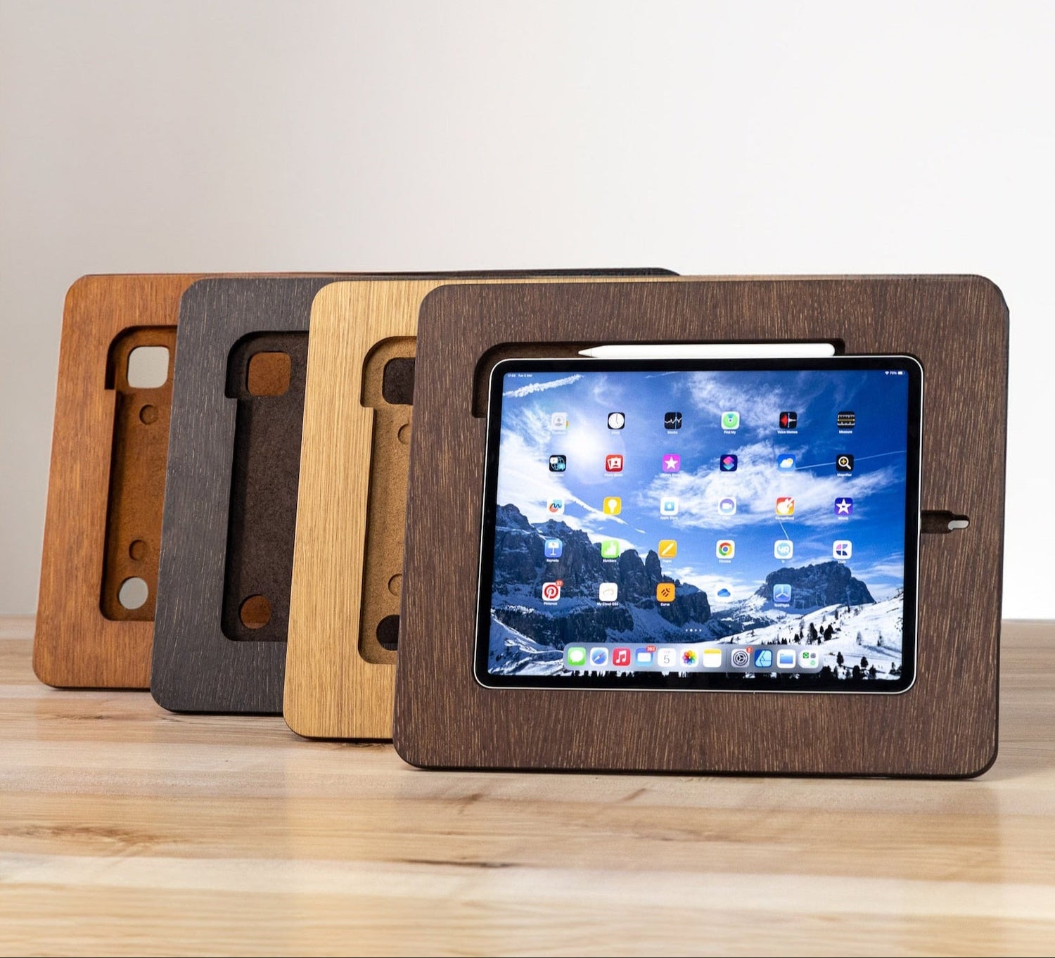 Wooden board for iPad and Samsung tab in four different colors showing variety of the product.