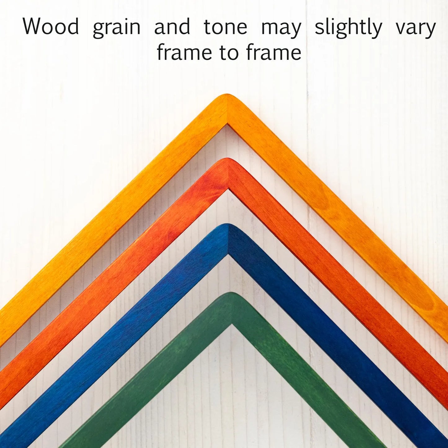 Corners of four picture frames in green blue orange and yellow with text "wood grain and tone may slightly vary frame to frame".
