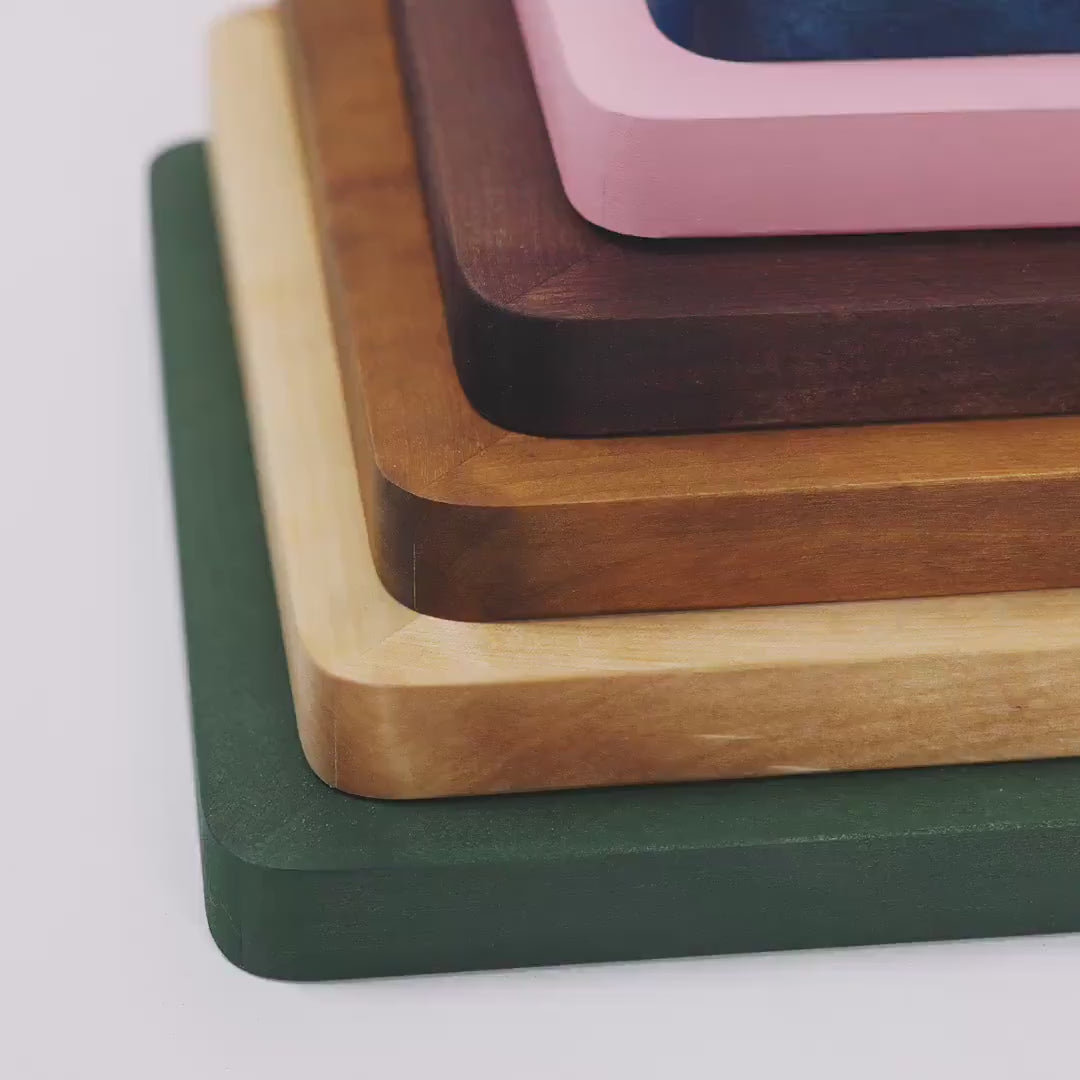 Video of multiple different colored wooden picture frames