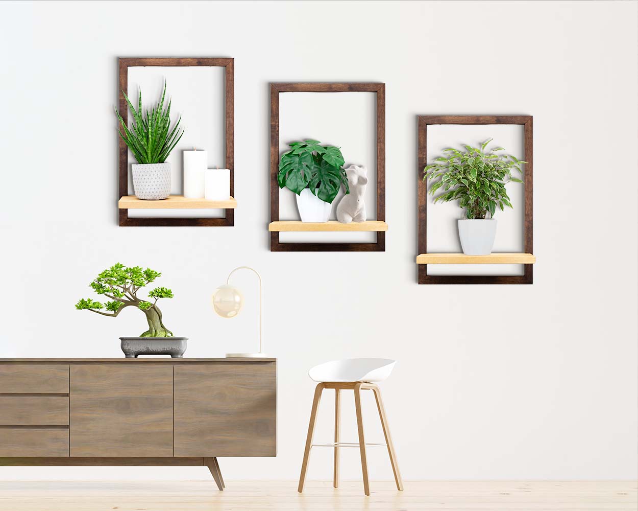 Three dark wood brown framed shelves hung on the wall of a cozy home holding plants and home decor.