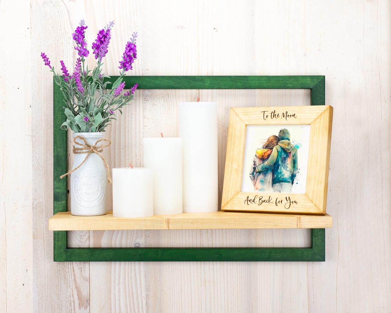 Green unique framed shelf hung on the wall holding flower vase, picture frame and candles, a gift idea.