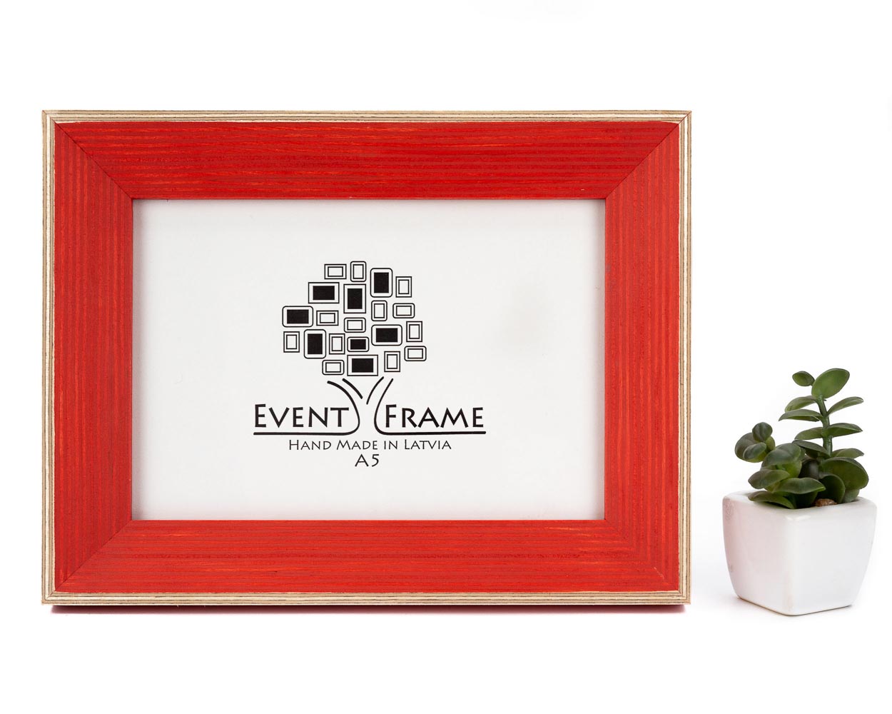 A classic light red picture frame with a white border and a black logo in the center, displayed next to a small potted plant. Red Wood Picture Frame, Hand Painted Artwork frames, Rustic Home Decor, Square 5x5 Photo Frame, Any Size A5 A4 4x6, 5x7, 8.5x11, 8x10, 8x12