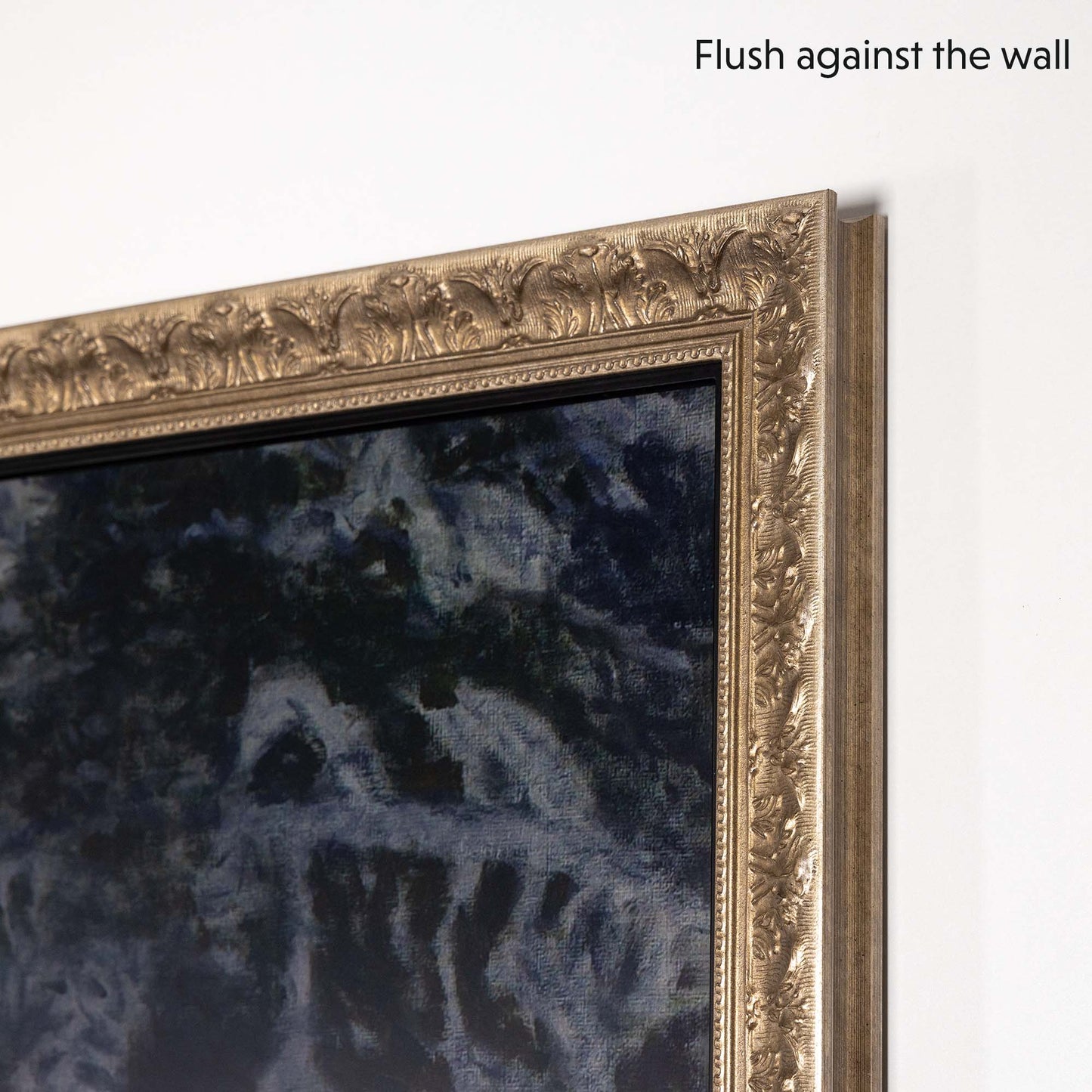 Antique Silver ornate TV Frame flushes against the wall