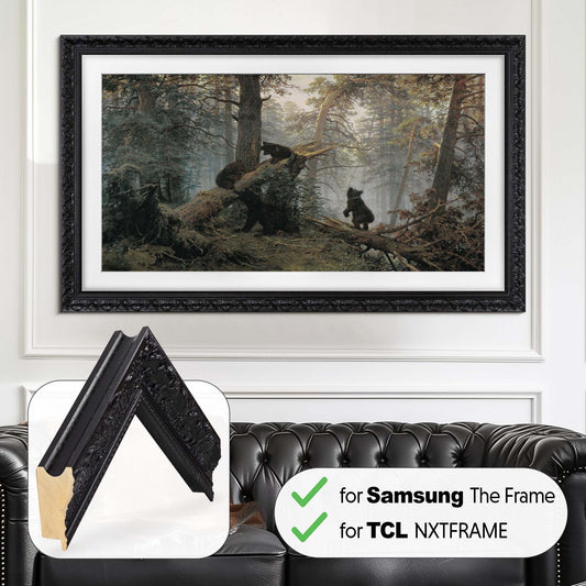 Black Ornate tv frame on wall mounted tv above black leather chesterfield sofa