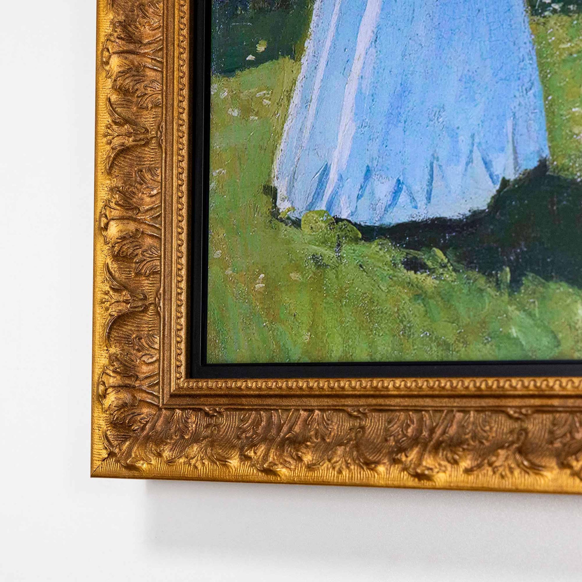 Close up to Ornate antique gold TV Frames corner