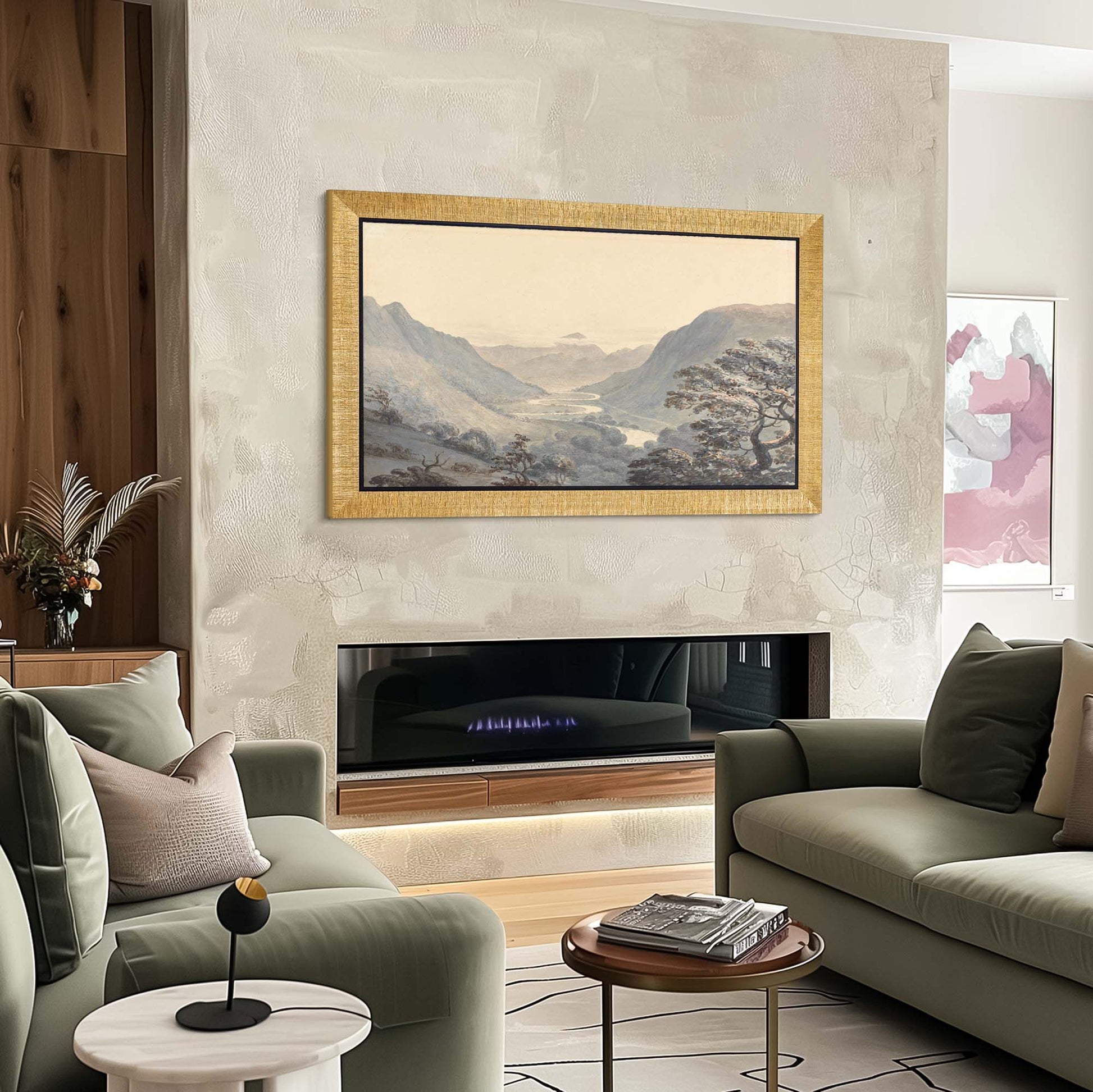 Grooved Gold TV Frame on the wall above fire place, sage green sofa