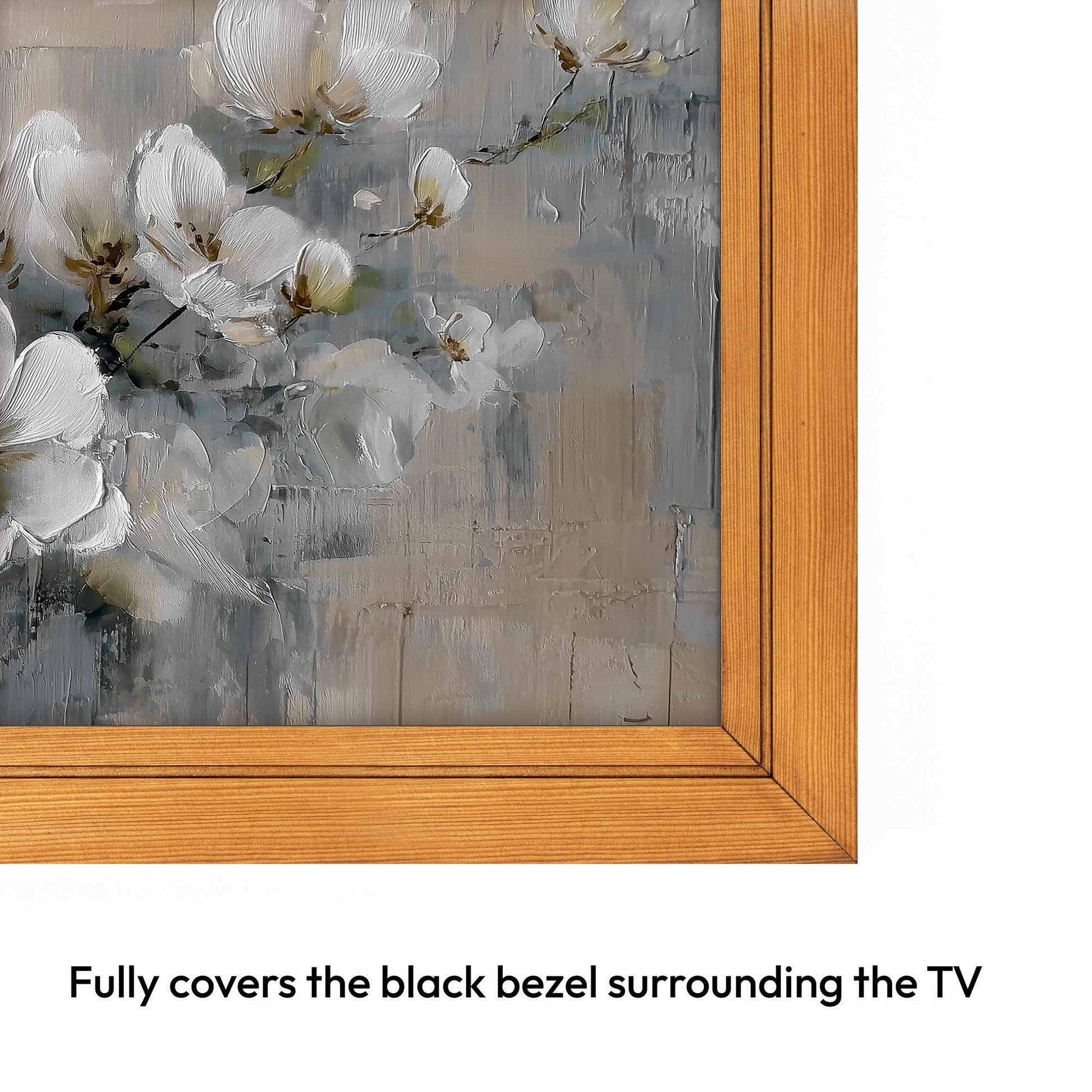 Framed artwork with white flowers on a gray background, covering a black TV bezel.