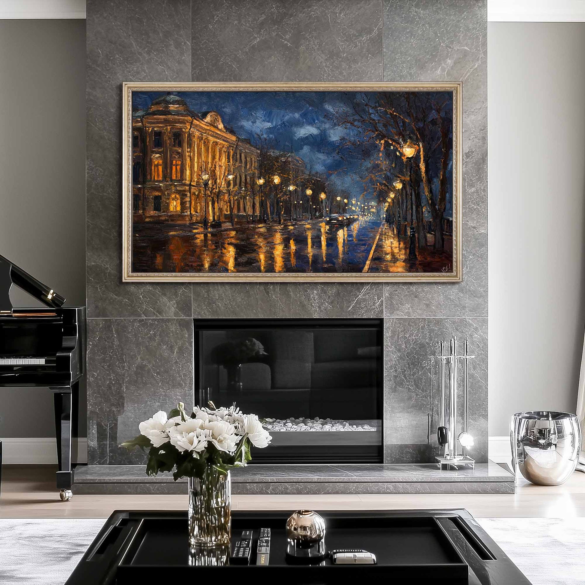 Silver Tv frame for The Frame TV on the wall above a limestone fireplace in modern living room design