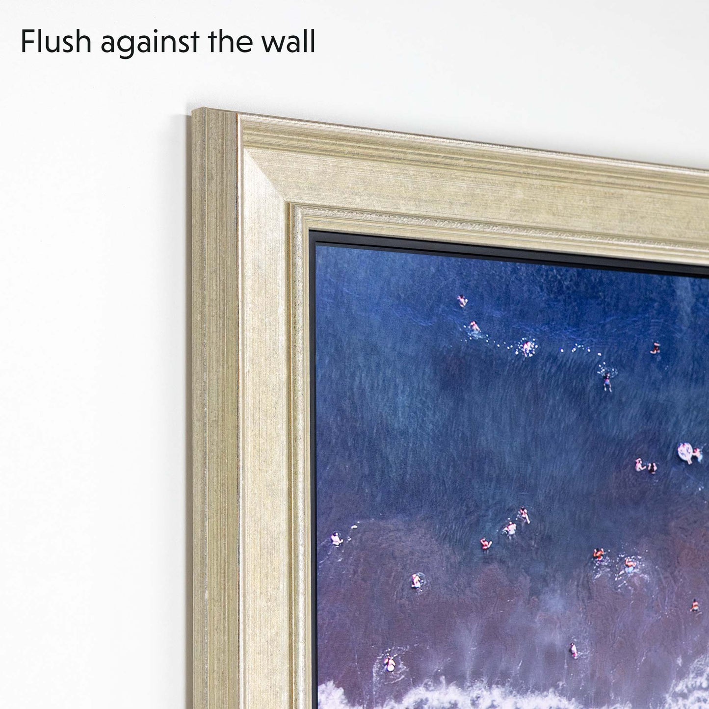 When mounted Champagne TV bezel flushes againts the wall