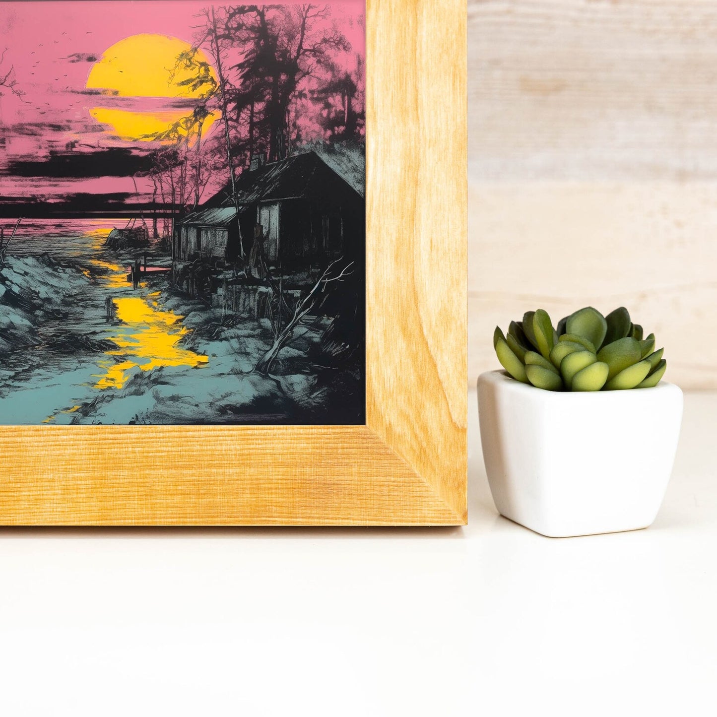 Framed artwork of a sunset over water with a small cabin, next to a potted succulent on a white surface. Natural BIRCH Picture Frame in Flat Style, Handmade Solid Hardwood Photo Frame, Modern Gallery Wall Frames, Custom Size A1 5x7 11x17 24x36