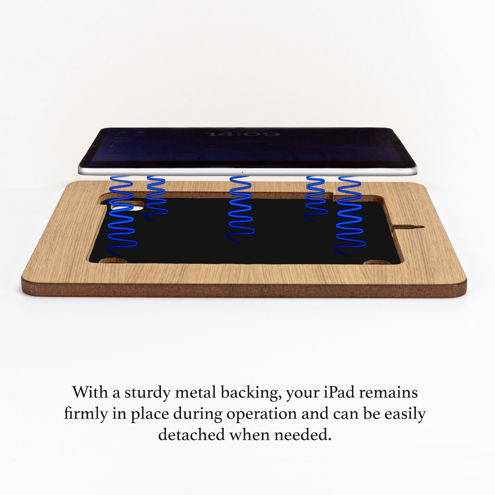 A visual showing the way an iPad could be firmly placed in a wooden board and could be easily detached when needed. 