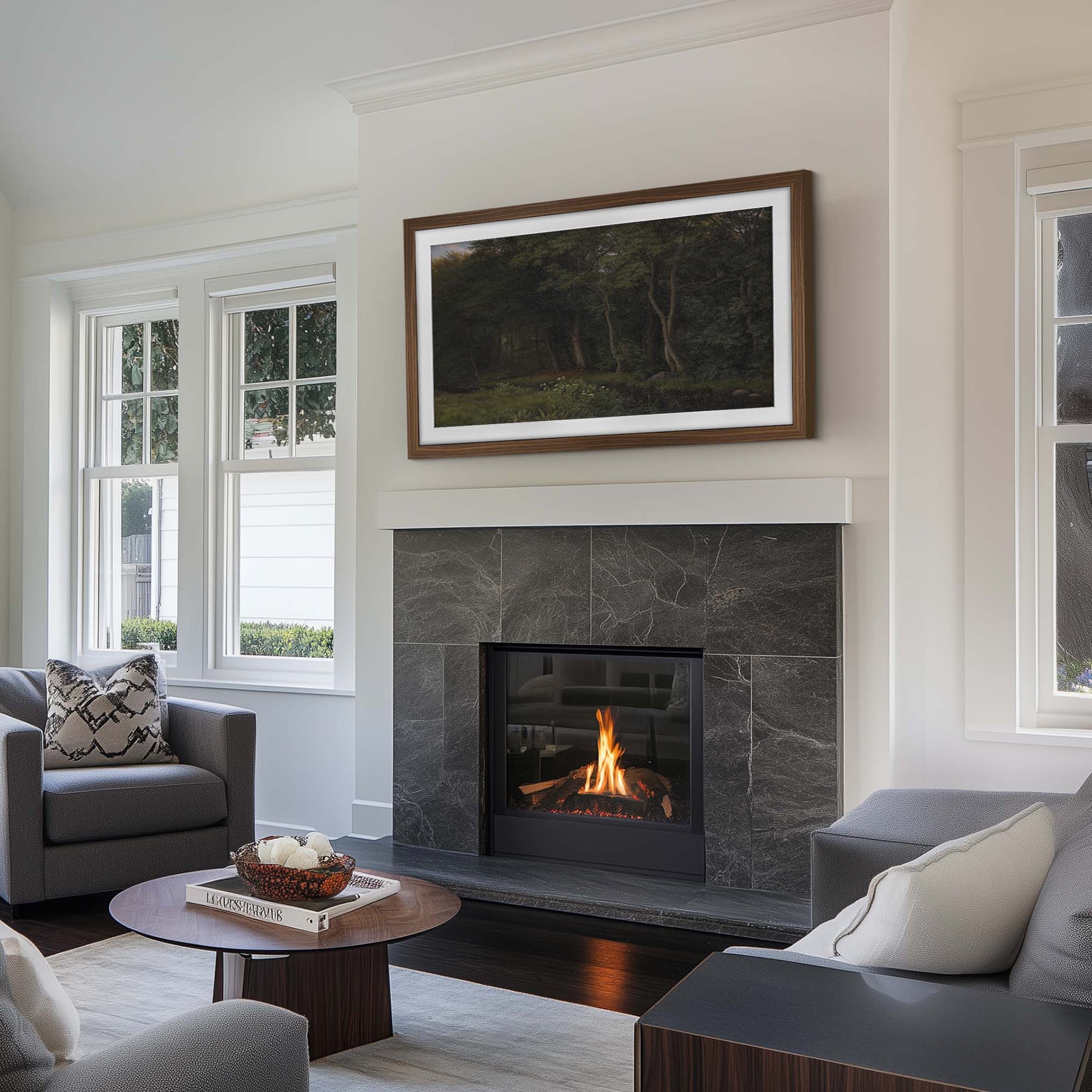 transitional living room with a standard stone fireplace and a wall-mounted tv