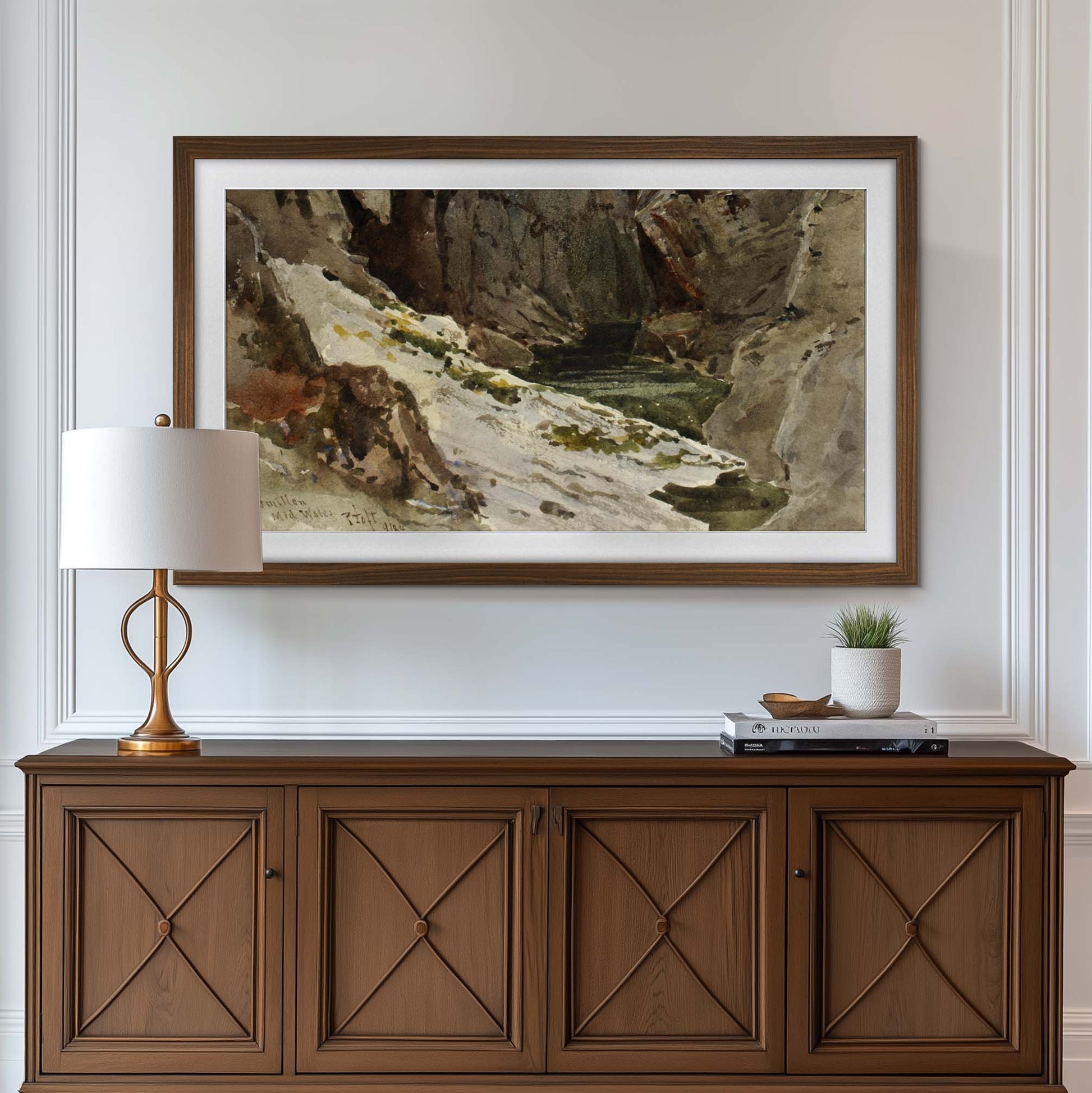 wall mounted Walnut tv frame above console in modern traditional living room design