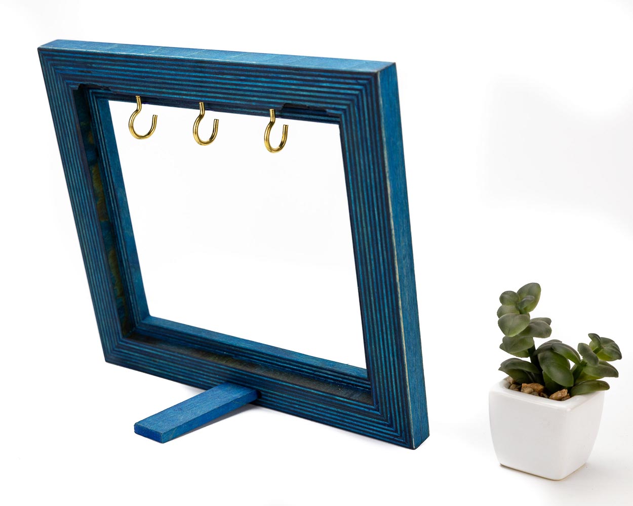 Blue wooden frame holder for keys jewelry memories accessories.