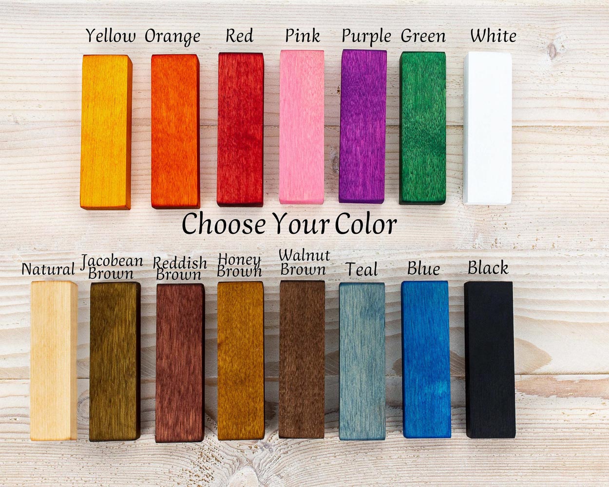 Colorful wood samples for handcrafted picture frames in yellow orange red pink purple green white and natural wood stain colors.